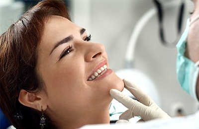 dentist checking smile