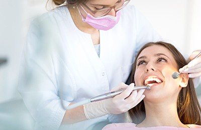 dentist doing cosmetic bonding