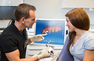 doctor putting to cerec machine