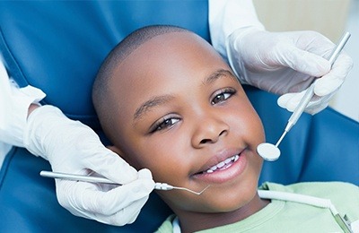 young child getting checkup