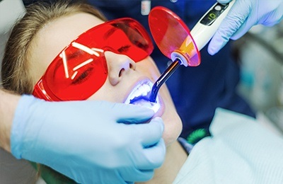 woman getting dental bonding