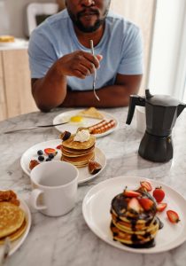 Man eating after dental implant surgery