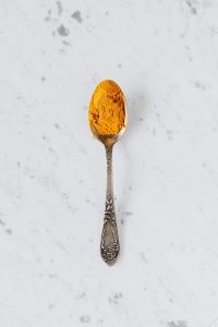 Turmeric on a metal spoon