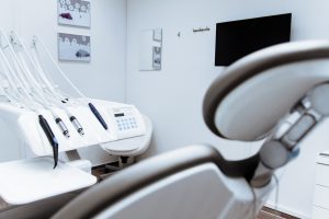 Empty dental chair in clean office